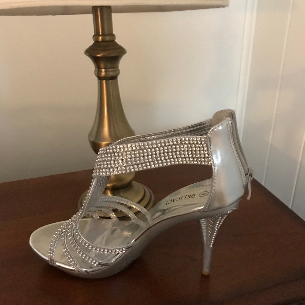 Silver high heels.